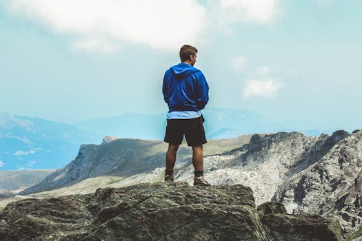 mountain climber enjoying the view