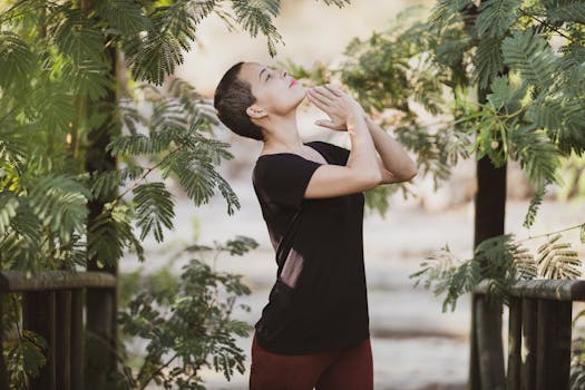 person meditating in nature