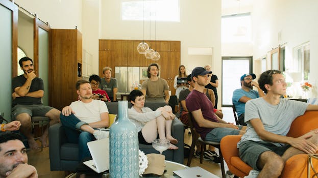 Group of young adults participating in an online workshop