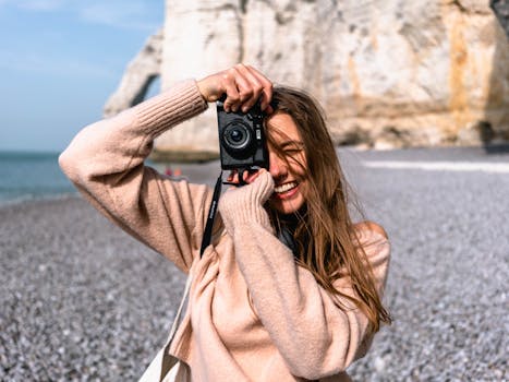 happy traveler taking photos on vacation